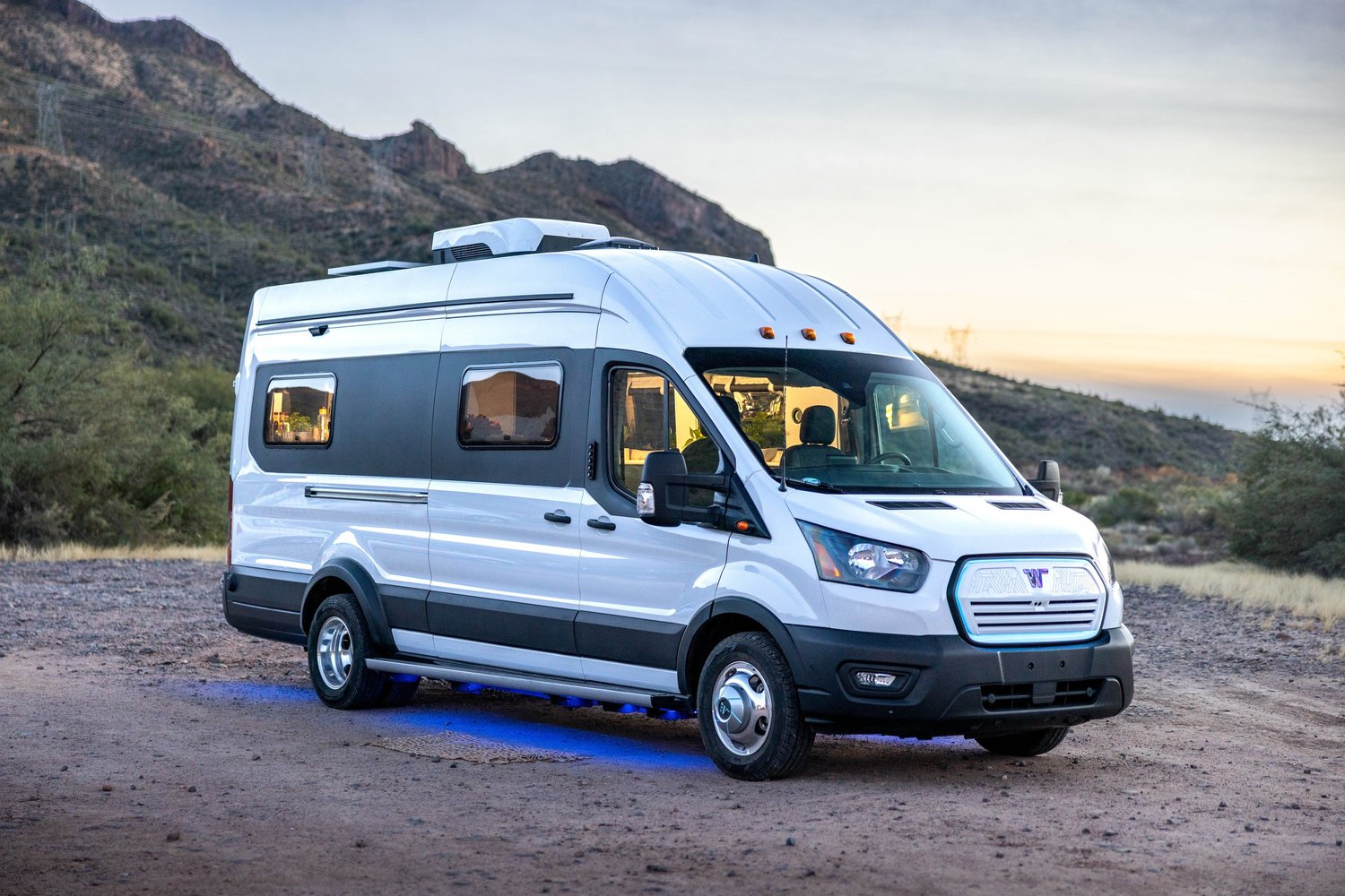 Travelers enjoying a lakeside campsite at Lake Tahoe